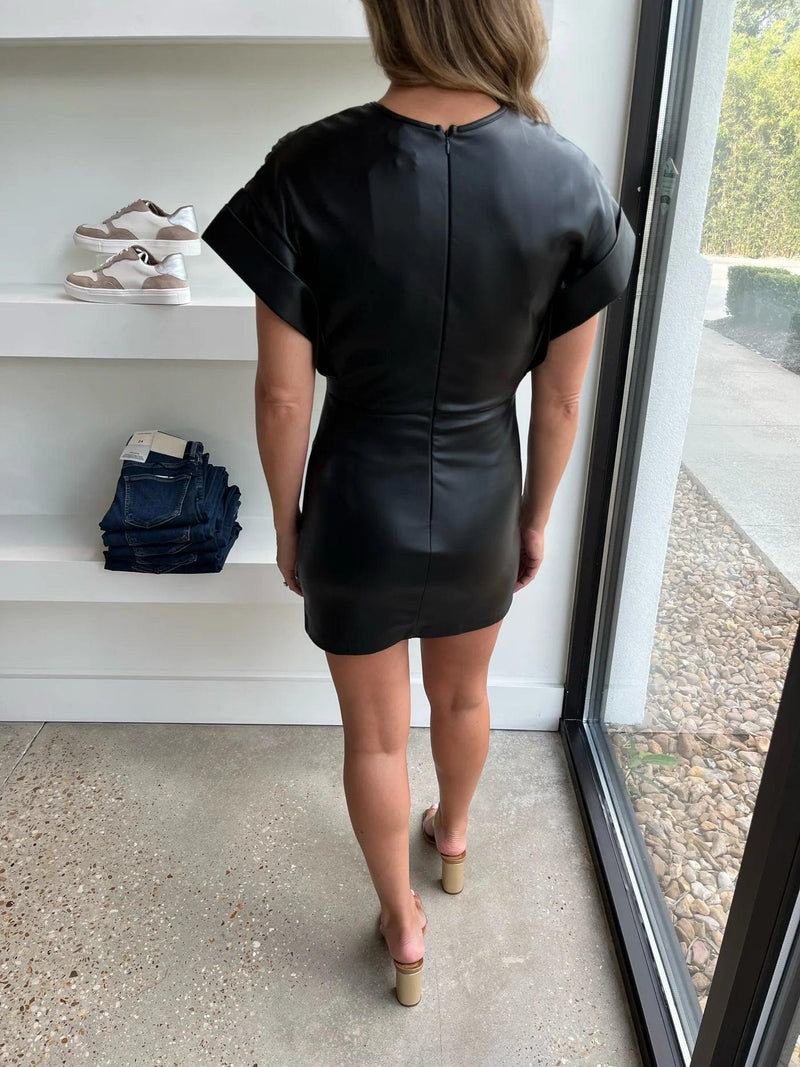 BLACK FAUX LEATHER CHELSEA DRESS - MELAS CLOTHING CO.